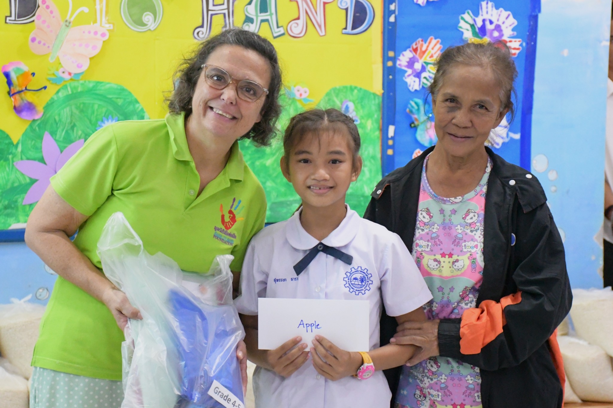 Young girl and teachers in Thailand